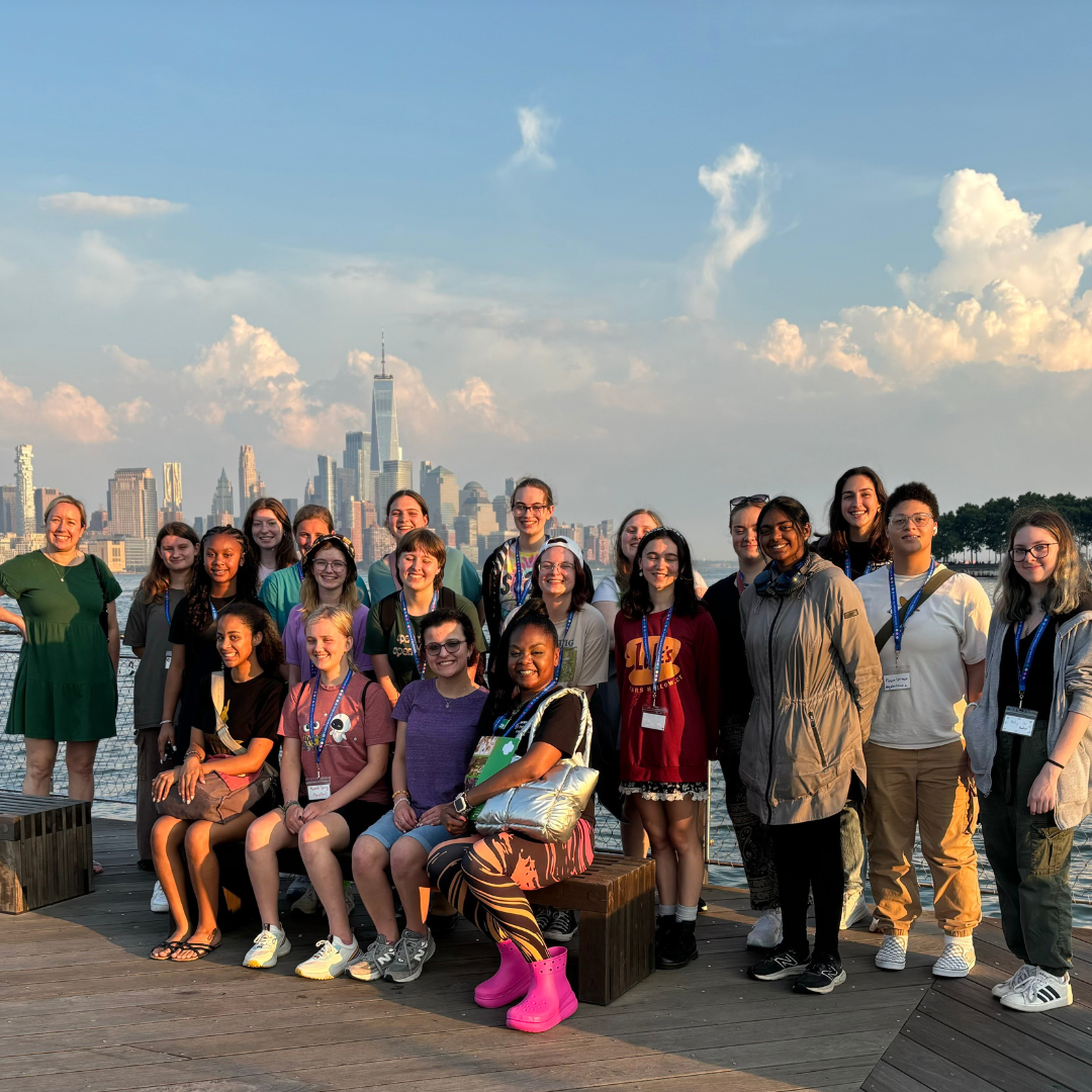 girl scouts with new york city skyline in the background
