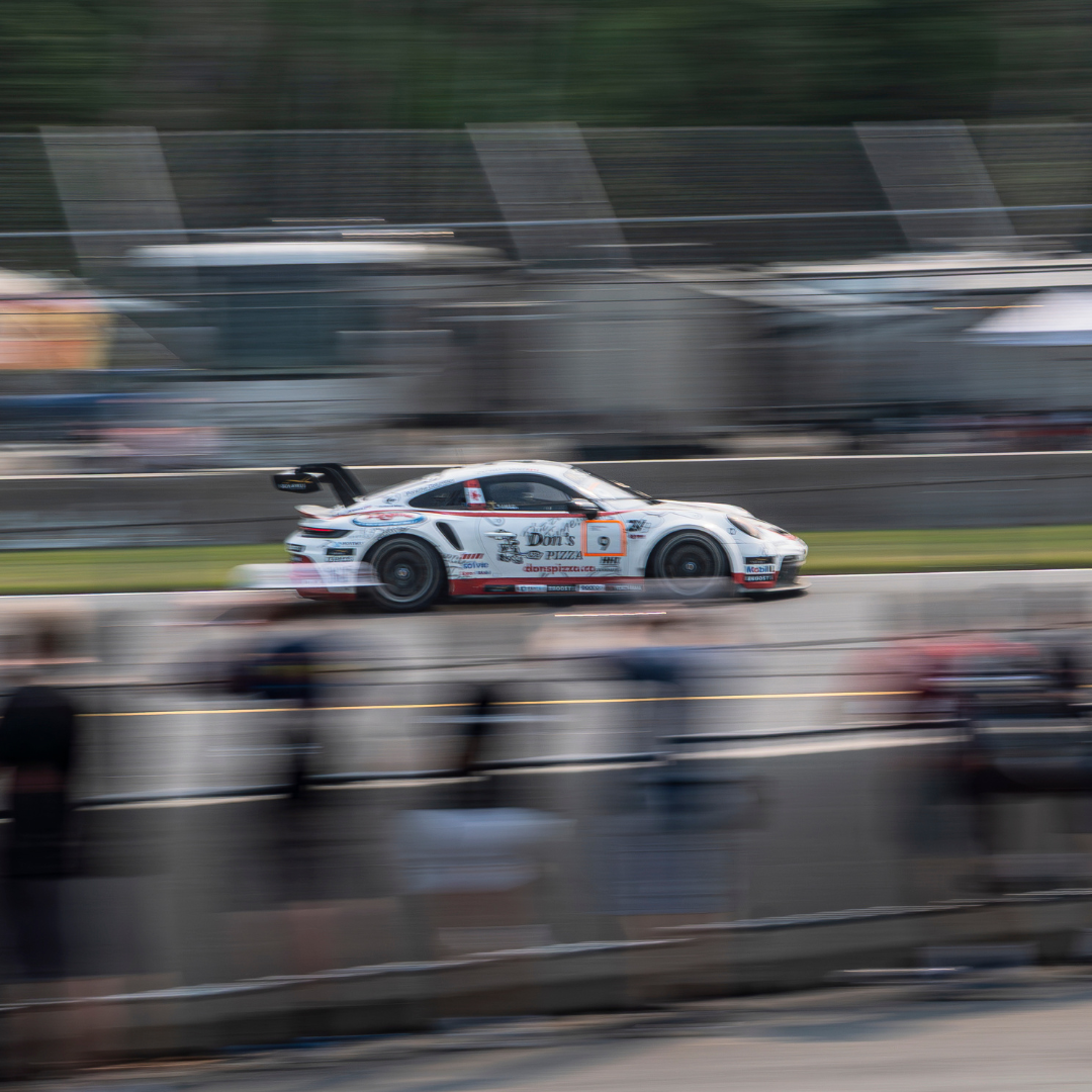 blurred photo of racecar