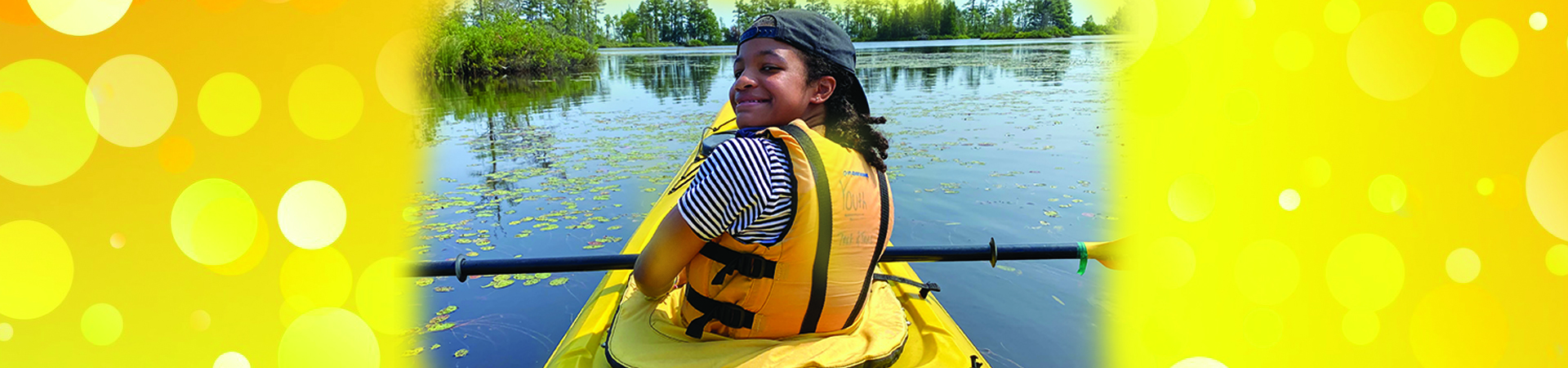  Girl Scout in kayak at summer camp 