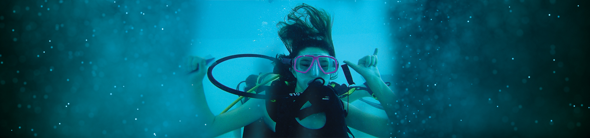  girl scout underwater in scuba gear 