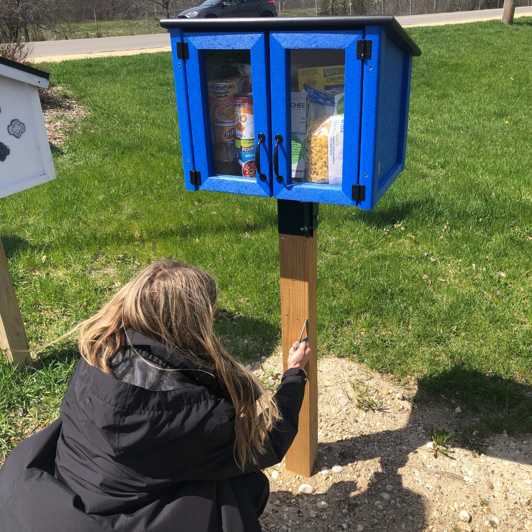 gold award girl scout constructing little free pantry