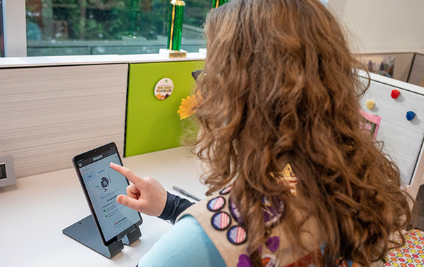girl scout using tablet