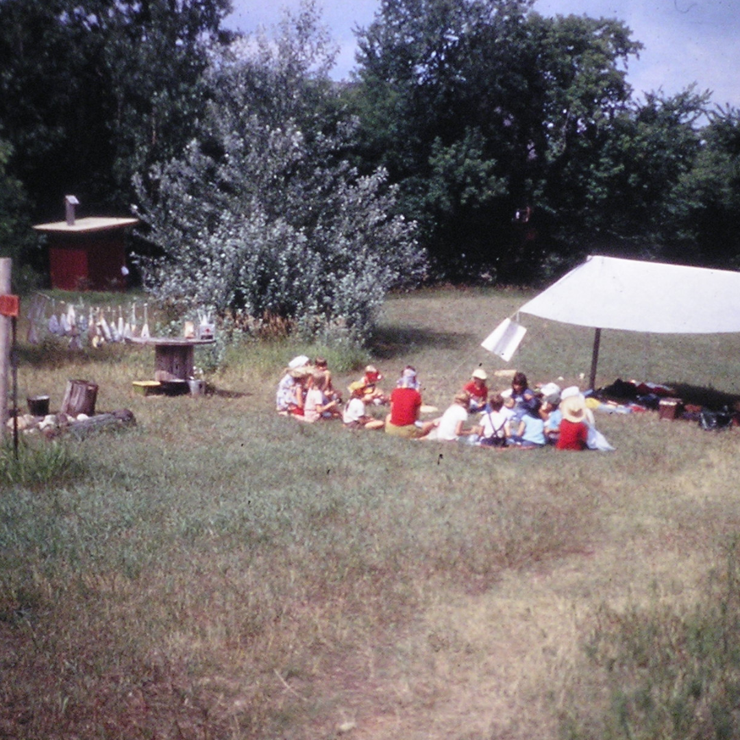 vintage photo of chinook program center with campers sitting