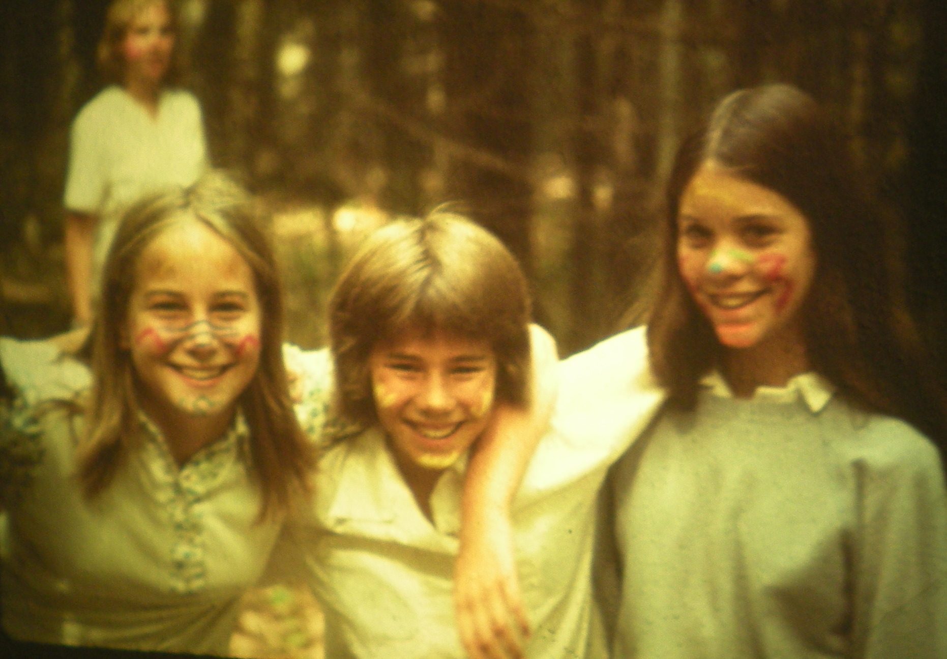 vintage photo of three campers with arms around each other