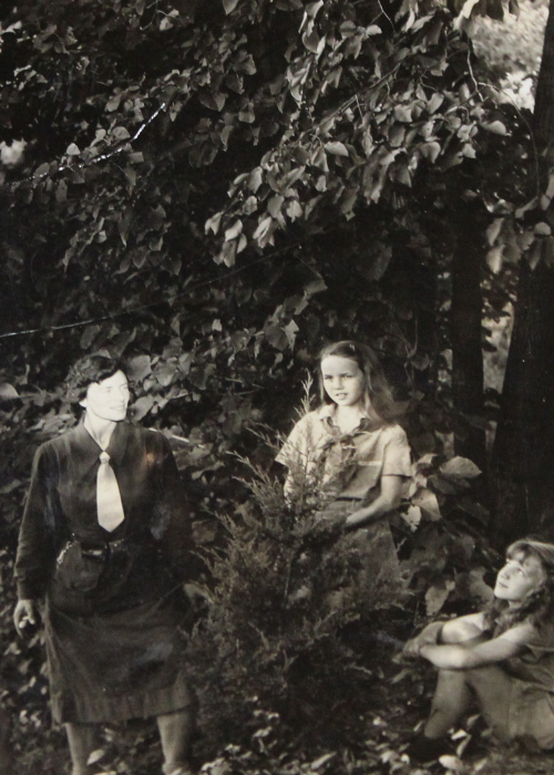 vintage black and white photo of campers exploring outdoors