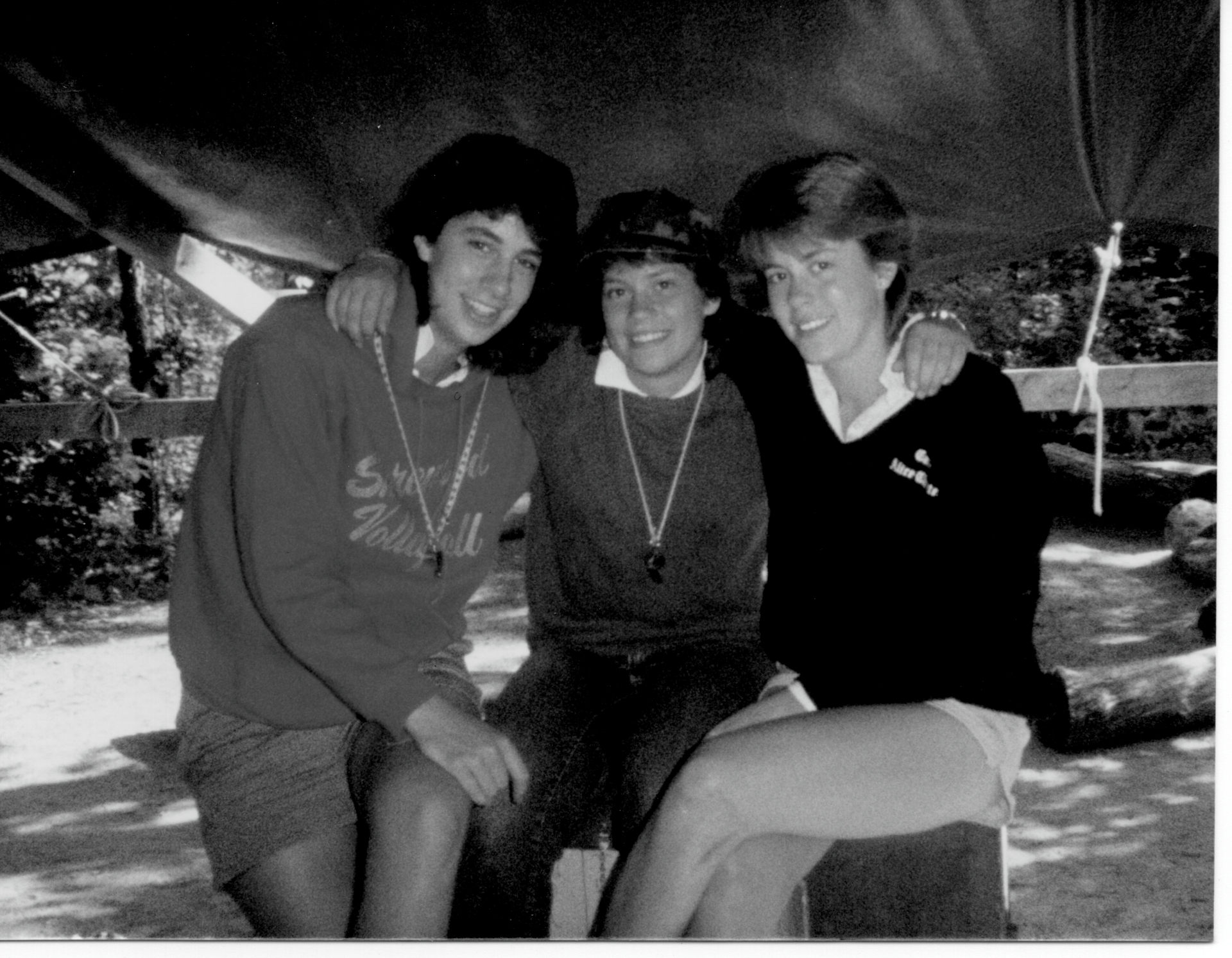 vintage black and white photo of three camp counselors in tent