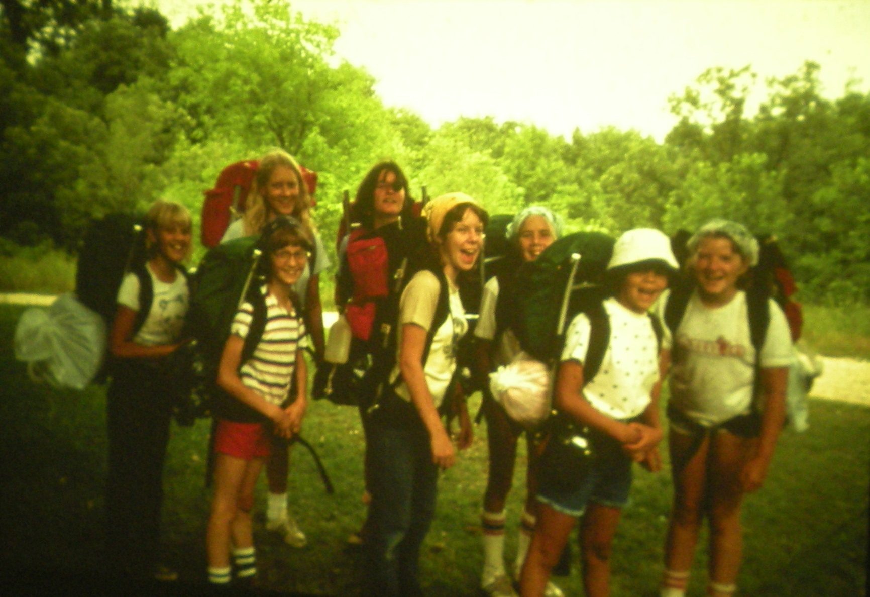 vintage photo of campers posing before backpacking