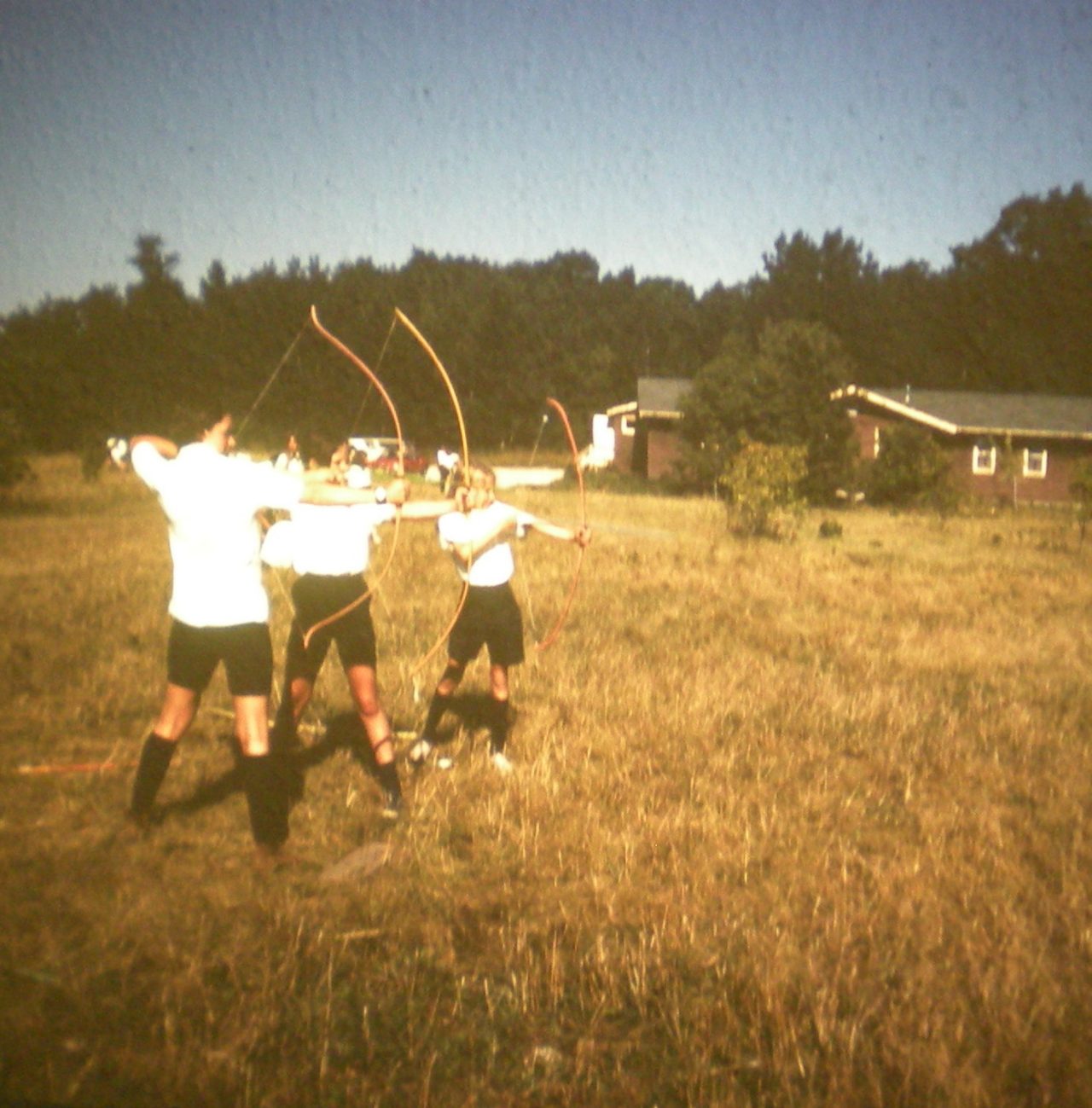 vintage photo of campers participating in archery