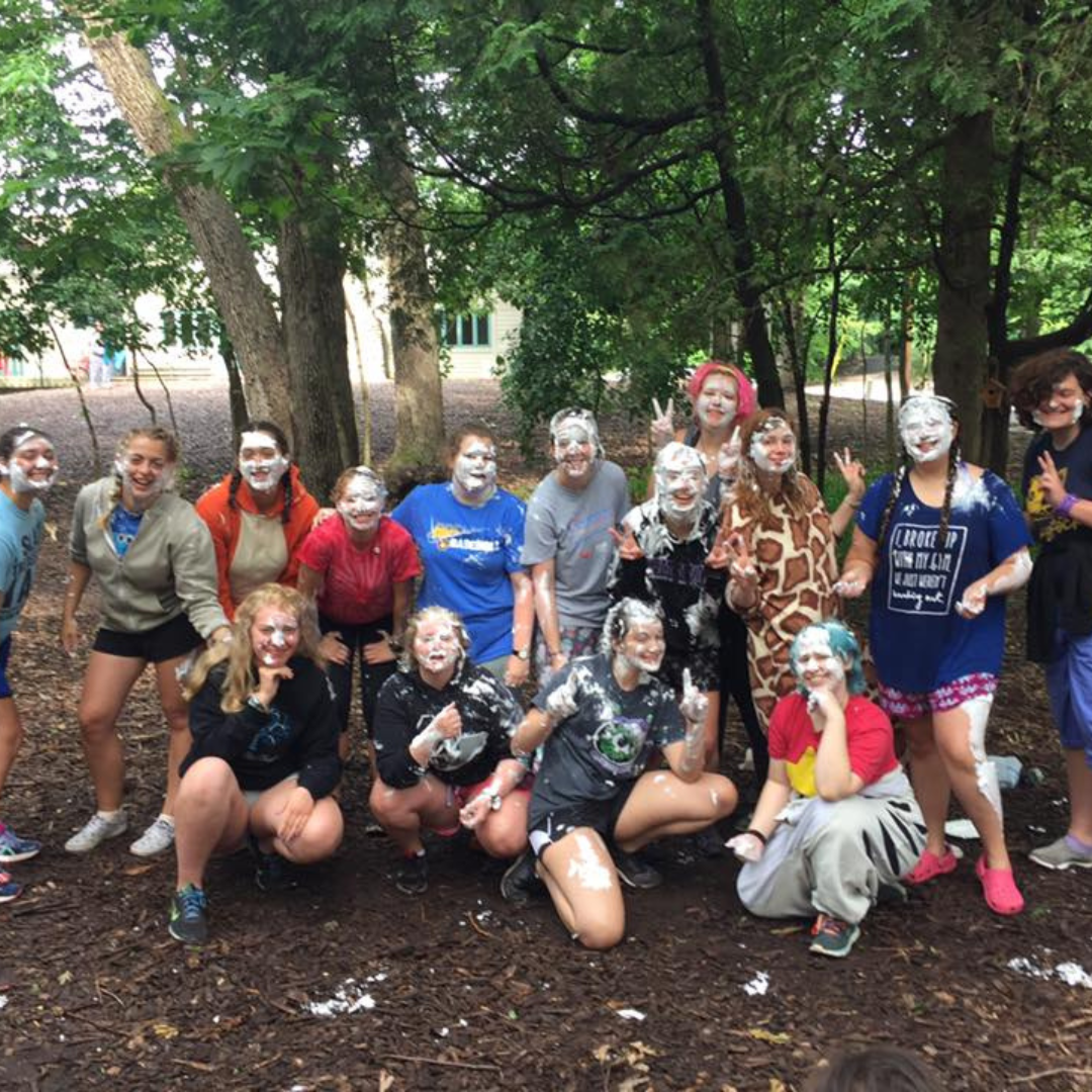 group of campers with shaving cream on face