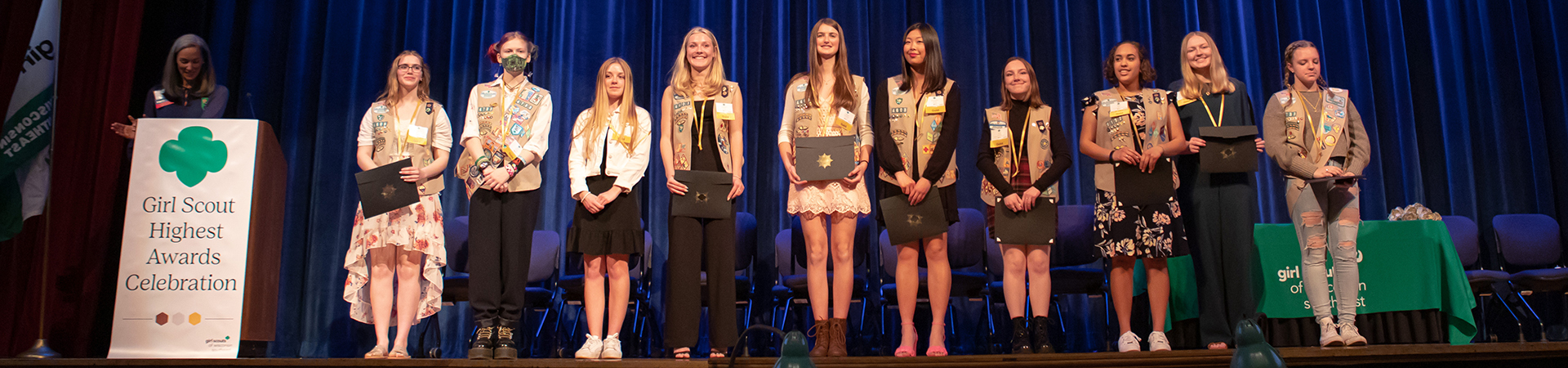  Ten Gold Award Girl Scouts on stage at Highest Awards celebration 