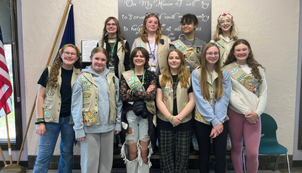 group of girl scouts working on silver award project