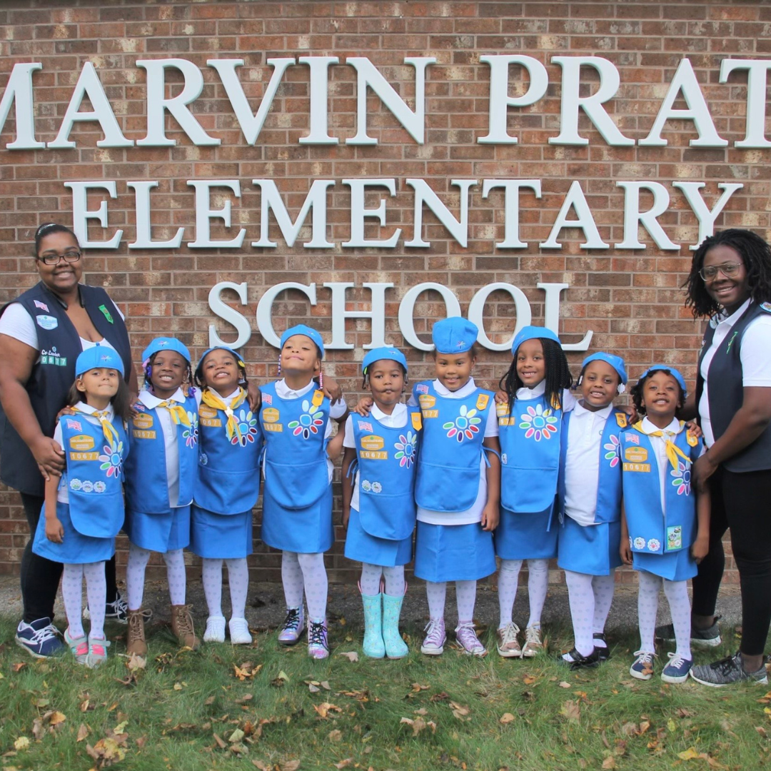 daisy troop of girl scouts with troop leaders